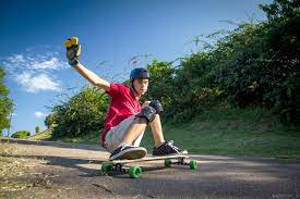 Front-side Slides on a longboard